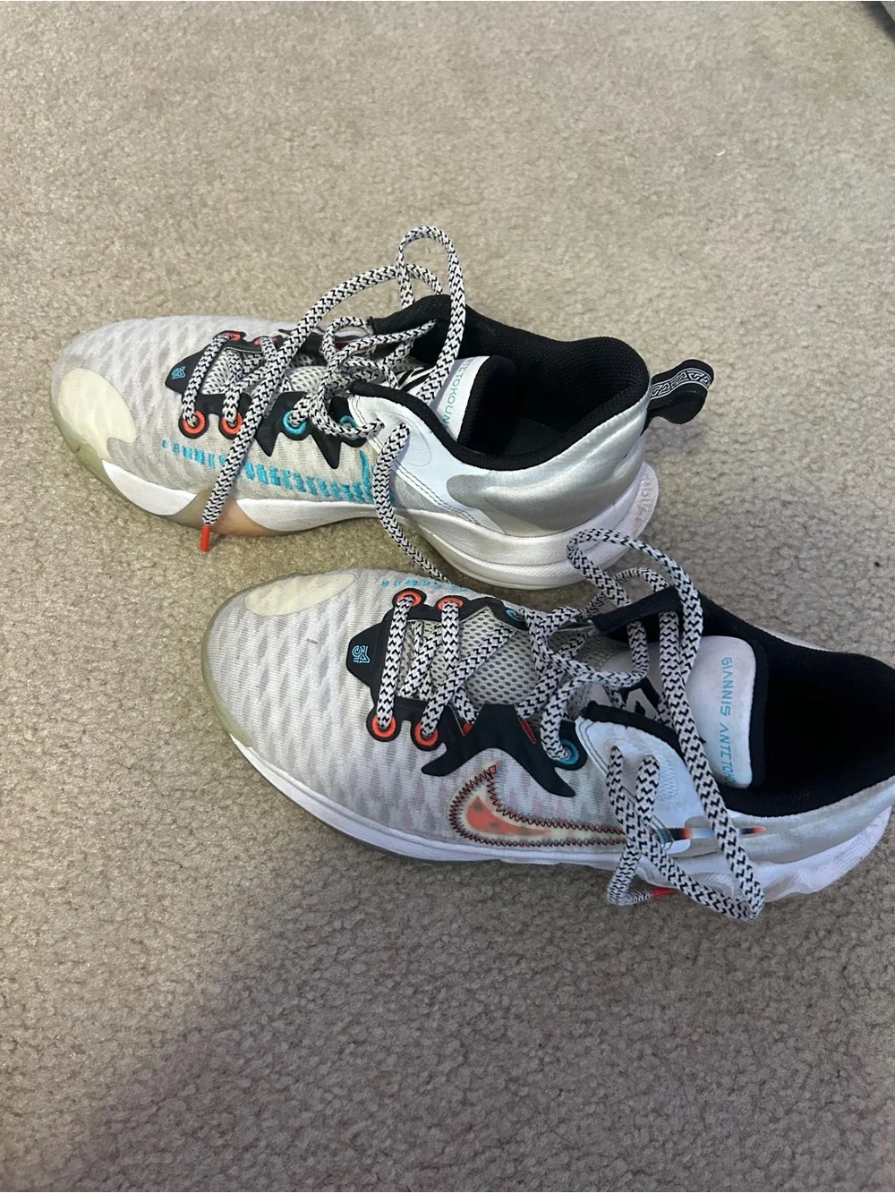 Nike White Sneakers with Black, Orange and Blue Accents